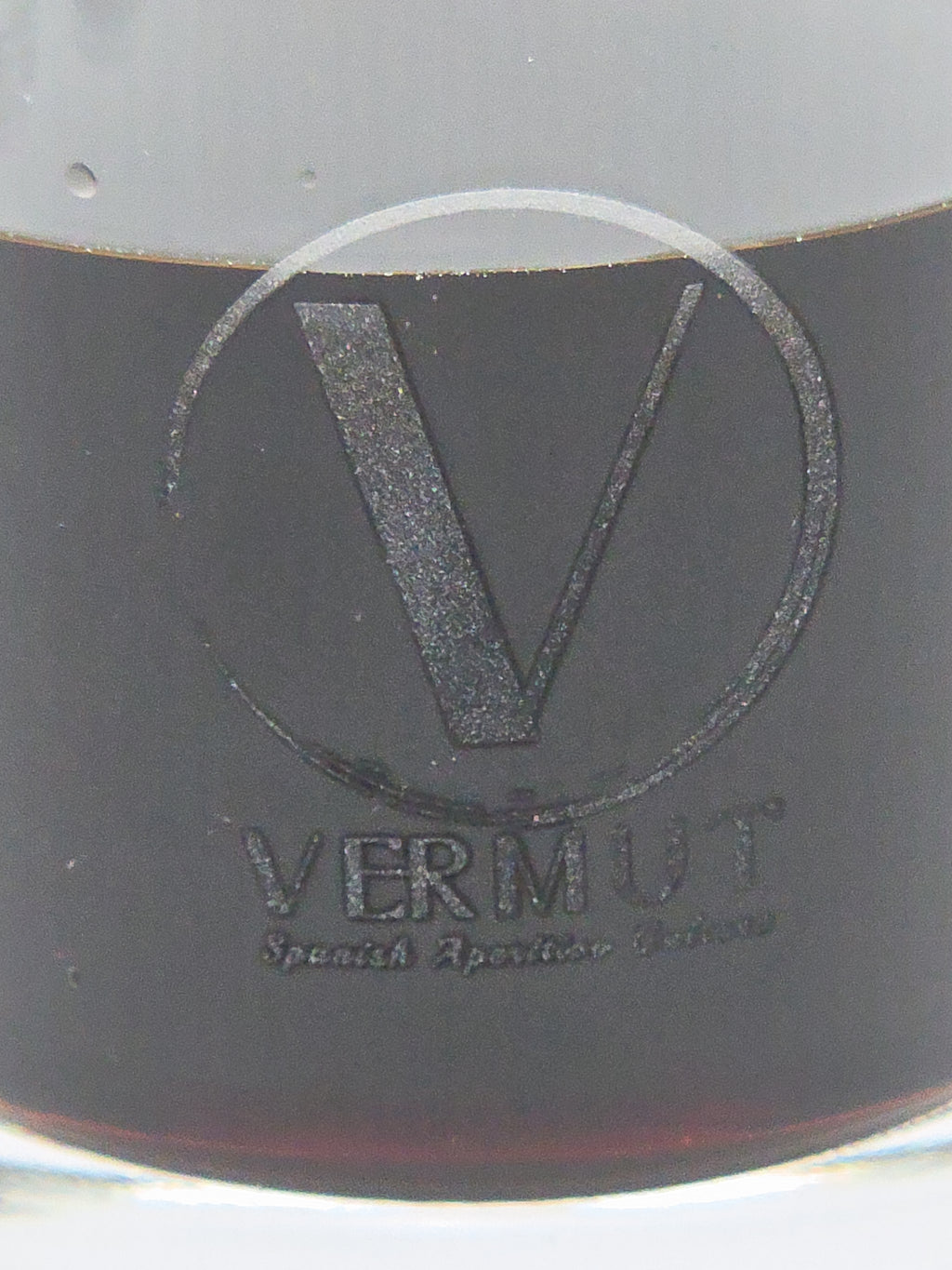 Close-up of Vermut Australia glass full of vermouth with 'VERMUT' branding
